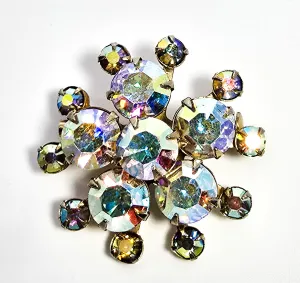 Aurora Borealis rhinestone golden star bust vintage mid century brooch