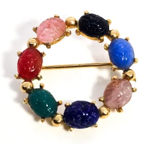 Egyptian Revival molded glass vintage scarab circle infinity brooch