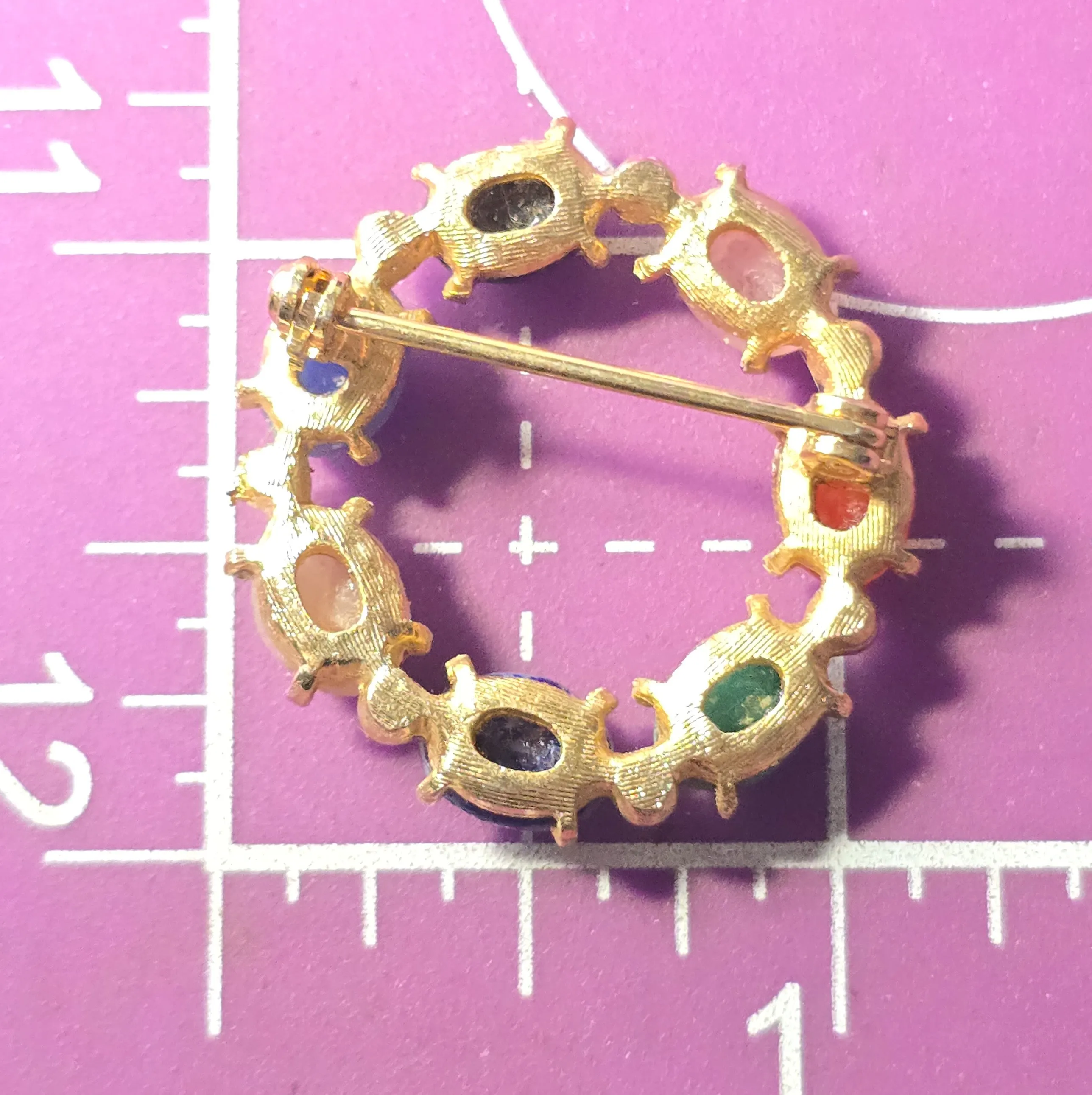 Egyptian Revival molded glass vintage scarab circle infinity brooch
