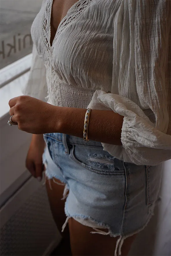 Evil eye gold bangle bracelet