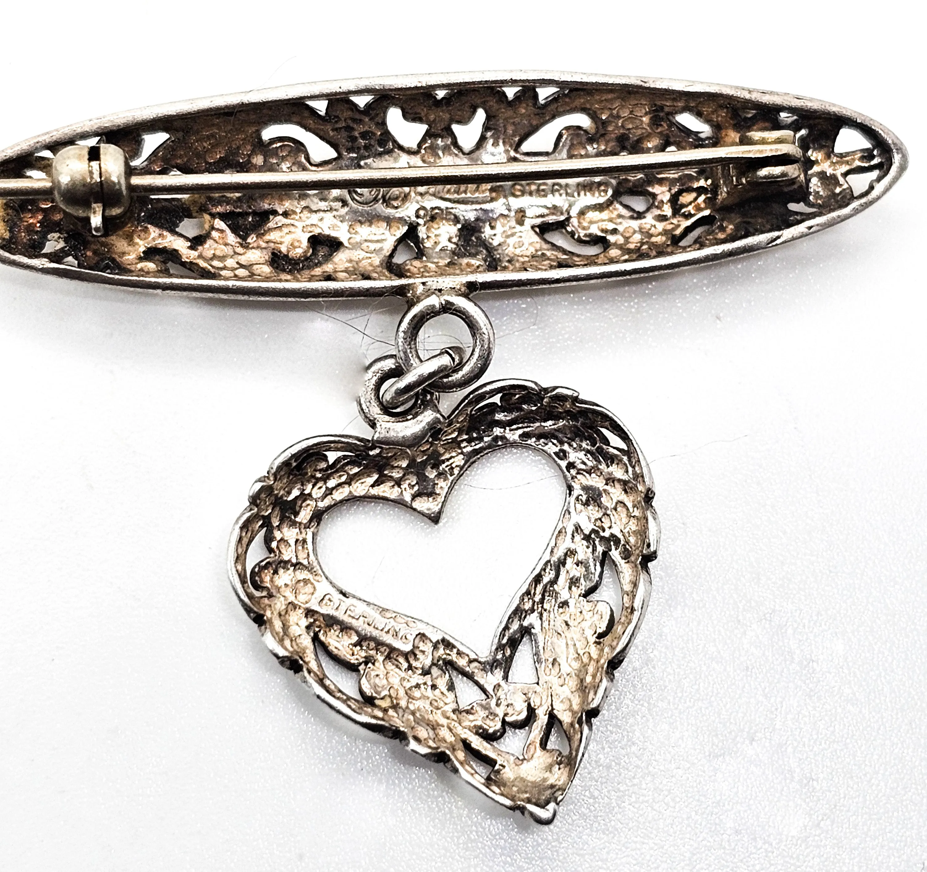 Jezlaine open work filigree heart drop medal style vintage sterling silver brooch