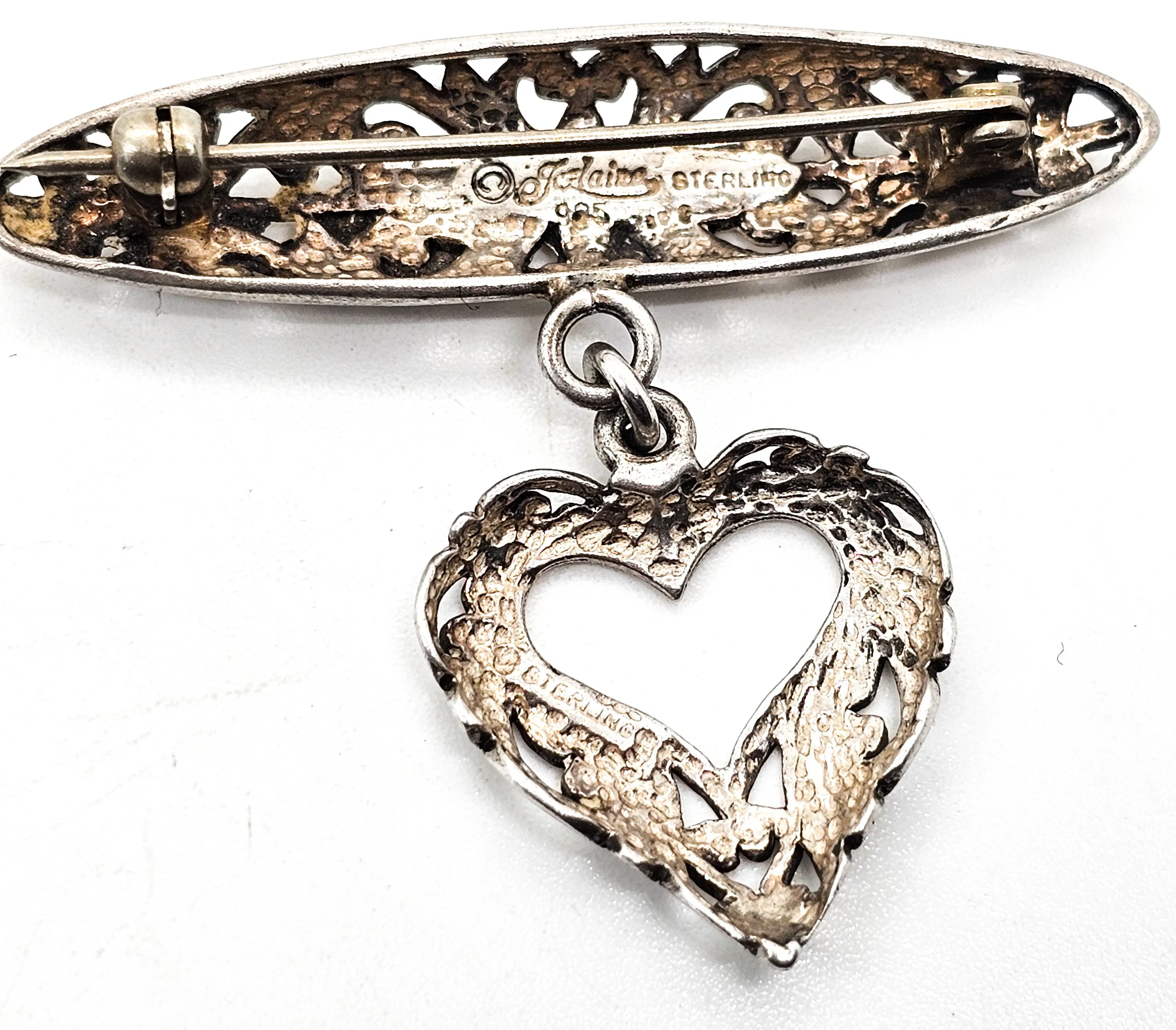 Jezlaine open work filigree heart drop medal style vintage sterling silver brooch
