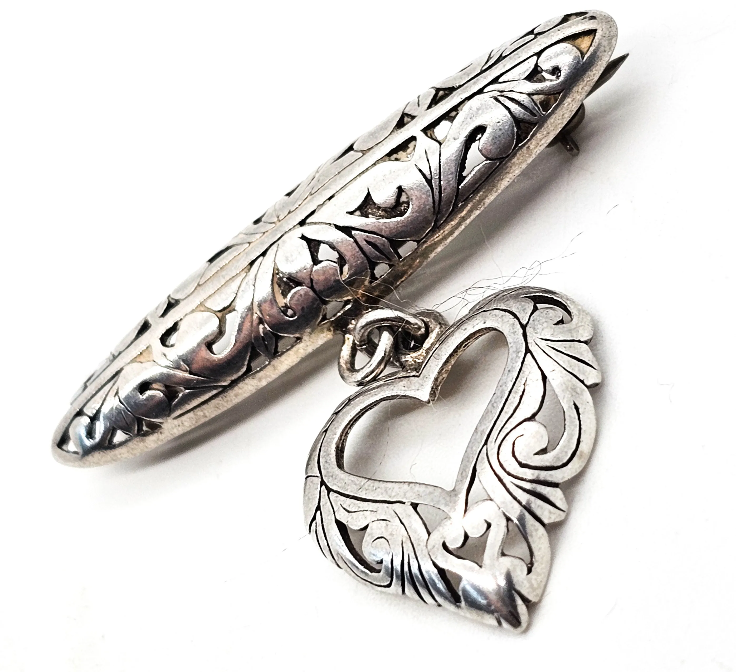 Jezlaine open work filigree heart drop medal style vintage sterling silver brooch