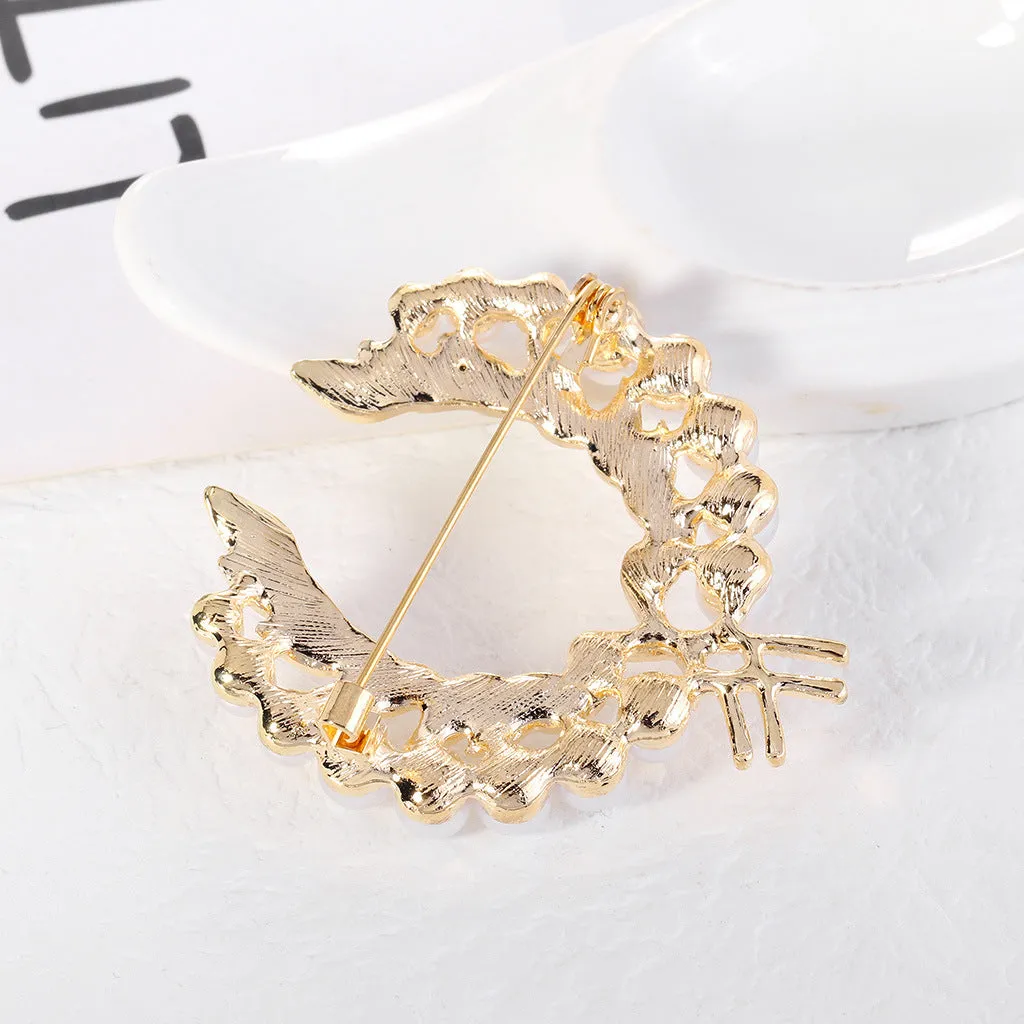 Laurel - brooch in the shape of an Olympic laurel