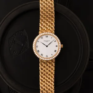 PATEK PHILIPPE CALATRAVA MODEL 3993/17 18 KARAT YELLOW GOLD AND DIAMONDS