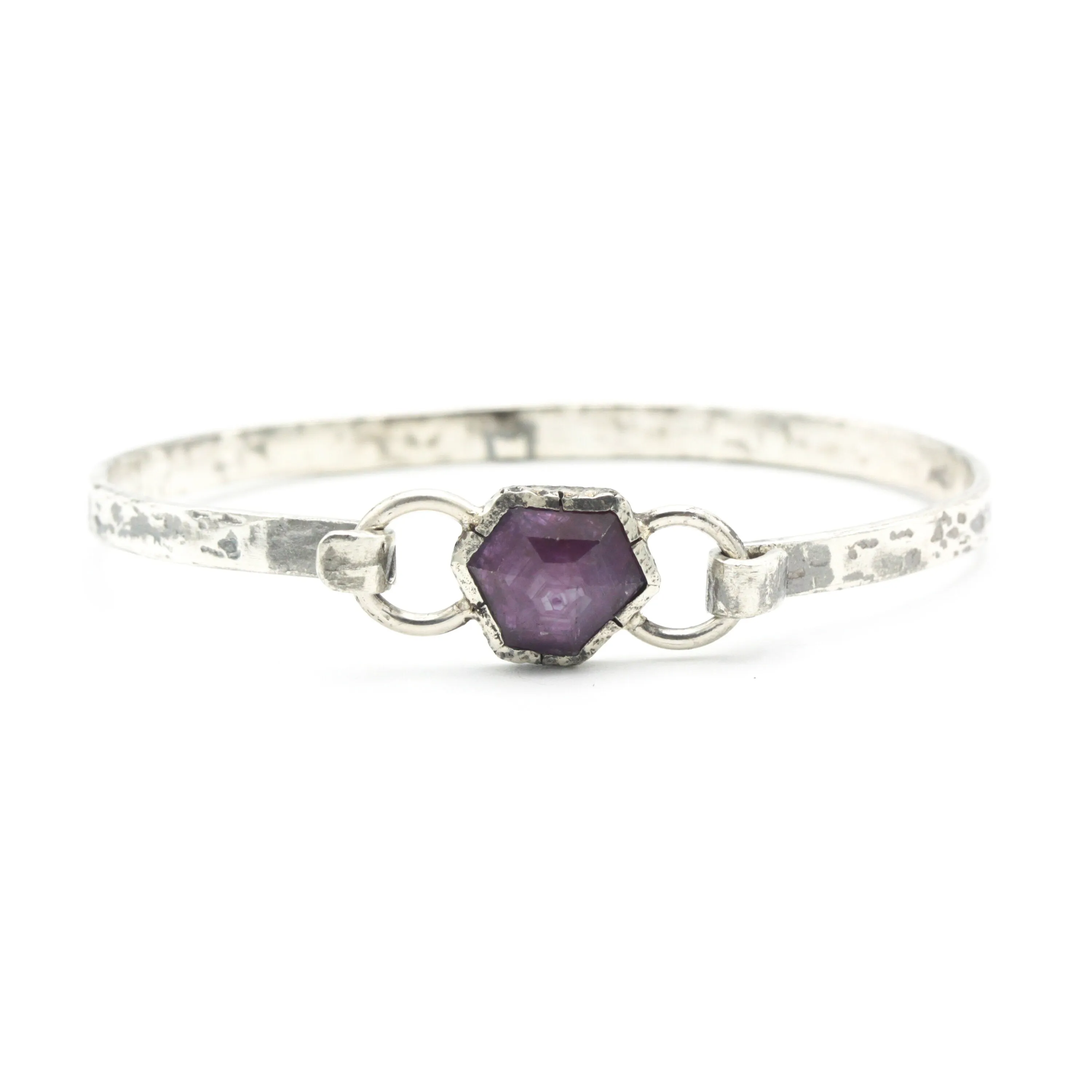 Pink sapphire bangle bracelet in silver bezel setting with oxidized sterling silver with texture band