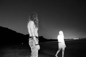 She Watches Her Double Walk Into The Lake
