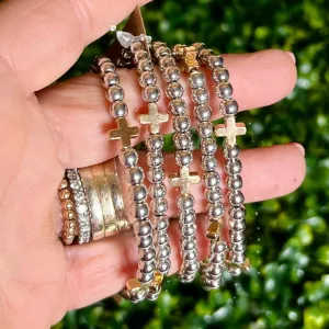Silvertone with Gold Crosses Stretch Bracelet